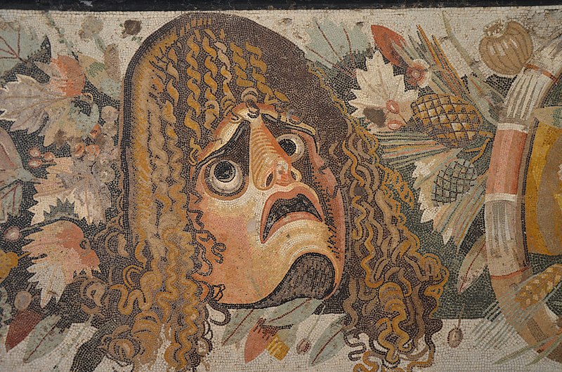 A Roman mosaic of a tragic mask from the ruins of the House of the Faun in Pompeii