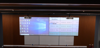 Two projector screens in a lecture theatre