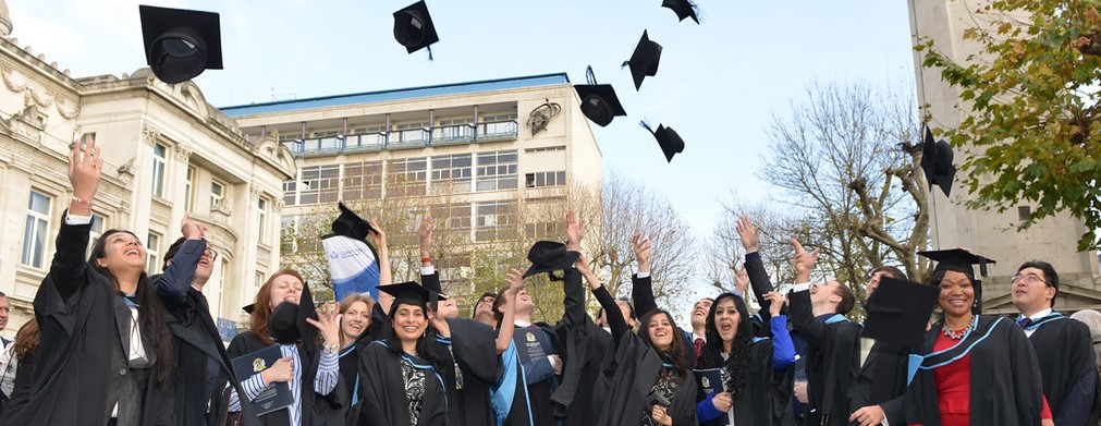 Image of graduating students celebrating