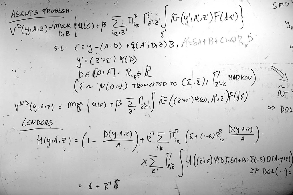Maths equations on a whiteboard
