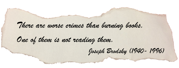 An image of a slip of paper containing the quote by Ray Bradbury. "There are worse crimes than burning books. One of them is not reading them."